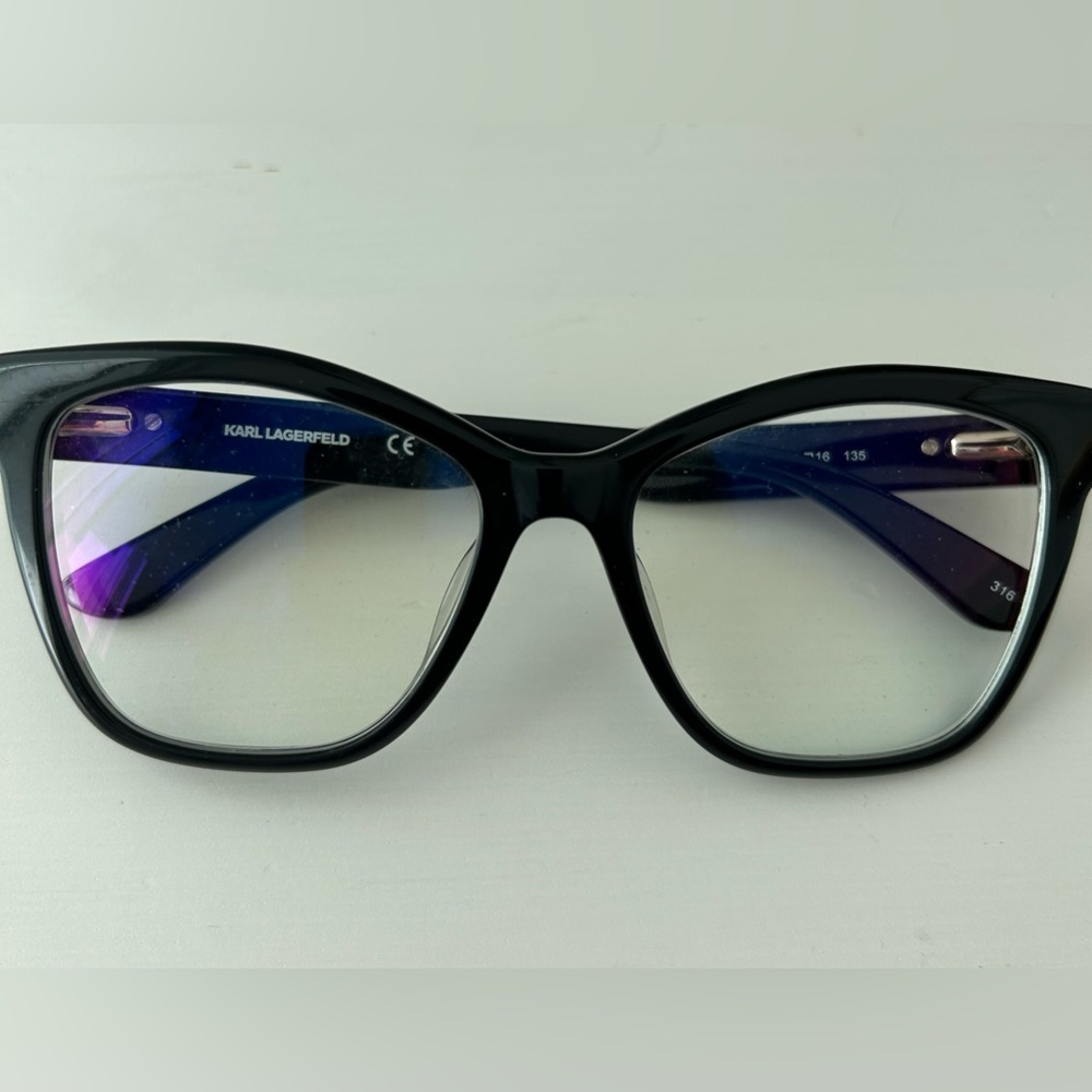 Karl Lagerfeld eyeglasses (with lenses -0.5 left; -0.25 right).” With box